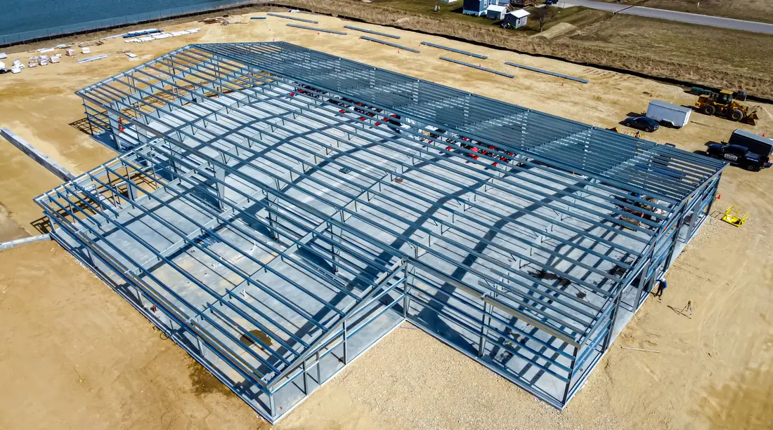 Aerial view of a steel building frame under erection